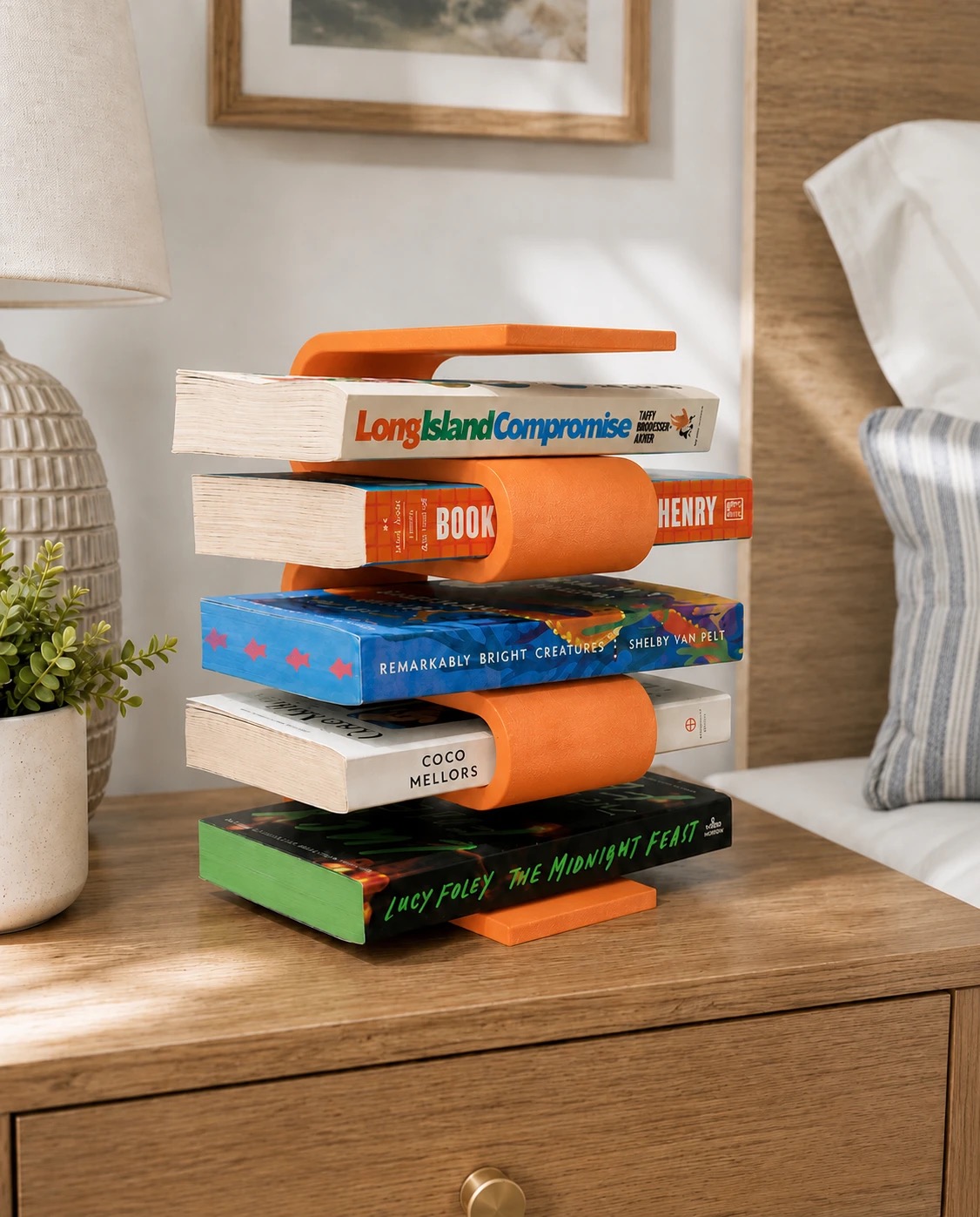 Mandarin Orange Cotton Street Bookshelf holding paperbacks